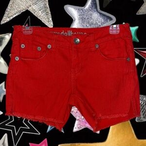 Y2K JUNIORS Red denim shorts with silver hardware. Distressed hem.